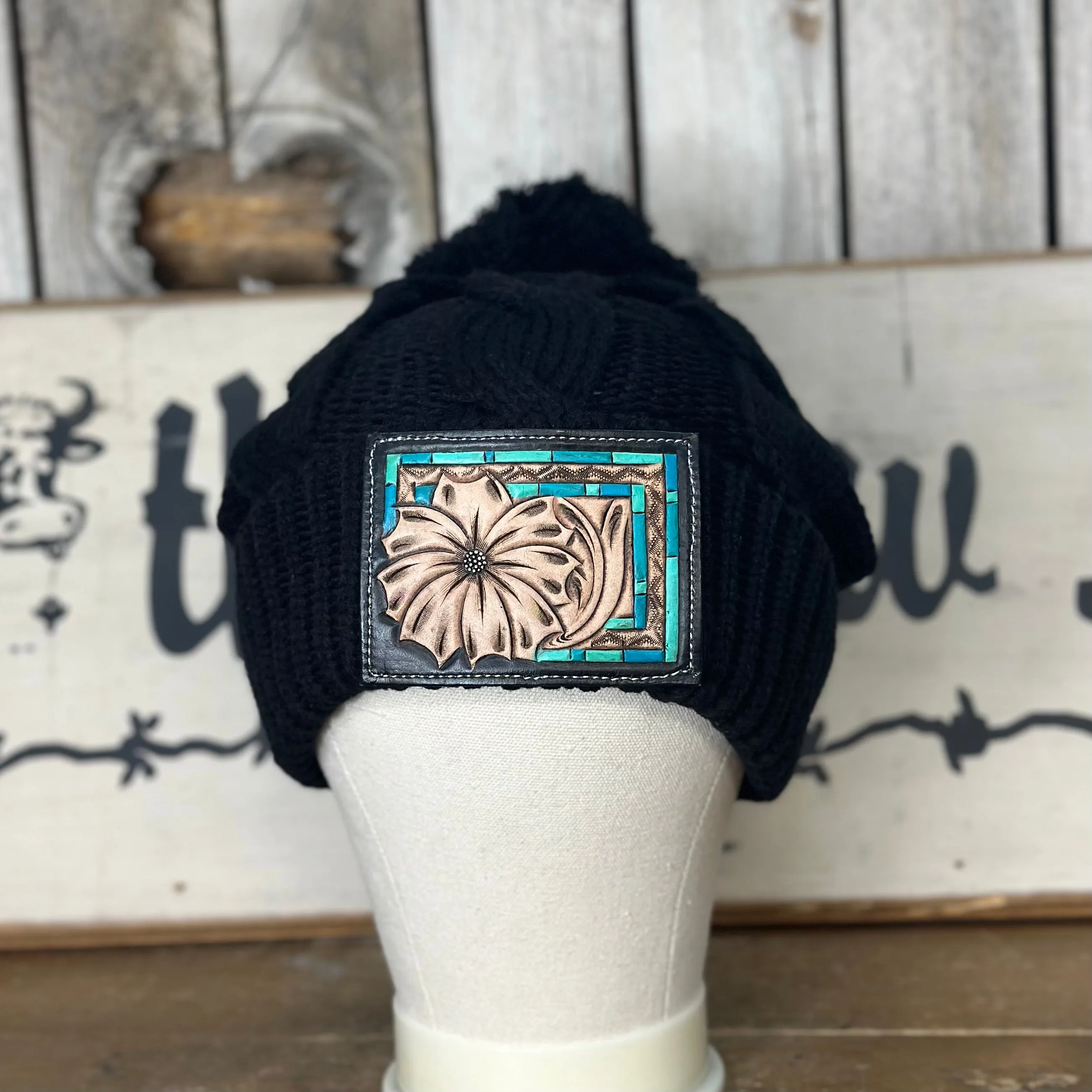 Amanda Rose Chunky Cable Knit Beanie w/ Pom and Hand Tooled Patch