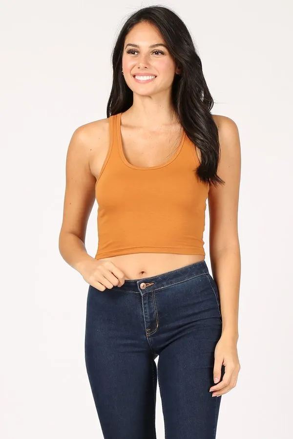 Racerback Tank Crop Top Sleeveless crop top with racerback and fitted bodice Model: 5'7" wearing size Small